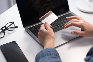 Shopping online is convenient, allowing individuals to purchase items from home with a credit card...
