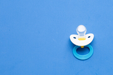 Baby pacifier with copy space. Top view
