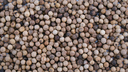 Aromatic and fresh white pepper, texture background
