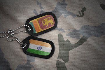 vintage army blank, dog tag with flag of sri lanka and india on the khaki texture background....