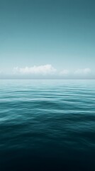 Obraz premium Serene ocean view under a tranquil sky.