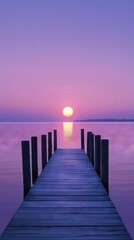 Obraz premium Serene sunset over calm water, pier extending towards the sun.