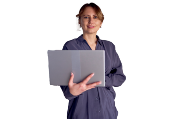 a beautiful middle age concentrated business woman wearing gray shirt and using laptop while standing in modern workspace