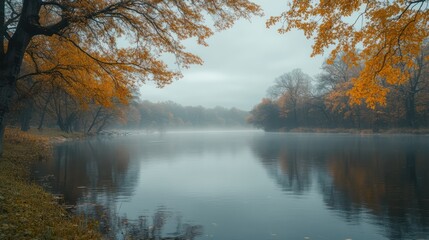 Obraz premium Serene Autumn River Reflections: Misty Morning by the Water
