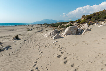 Mediterranean seacoast at the Patara beach on a sunny day with blue sea Antalya region, Turkey.