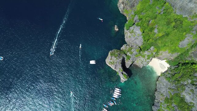 World famous Maya Bay in Phi Phi Islands, 4k drone video, high altitude view of popular bay in Thailand