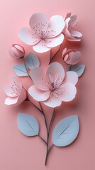 Delicate paper flowers on pink background