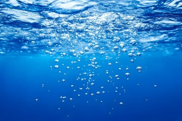 Obraz premium A serene underwater scene with blue water and rising bubbles creating a tranquil atmosphere