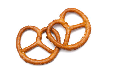 Small pretzels on white background. German traditional pastry.