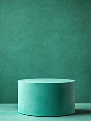 Green podium for product presentation with textured monochromatic backdrop