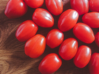 tomatoes on a wooden board