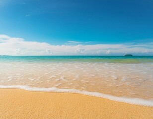 Fototapeta premium Sunny Beach With Golden Sand and Calm Waves Under Bright Blue Sky Midday