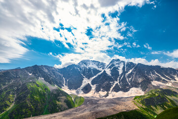 Beautiful dramatic view of the rocky glacier Semerka. North Caucasus
