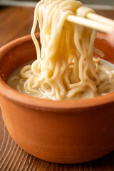 shoyu ramen in traditional bowl close up