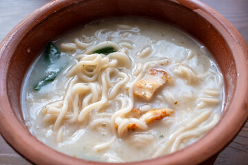 shoyu ramen in traditional bowl close up