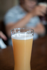 Glass of beer with blur background
