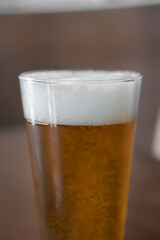 Glass of beer with blur background