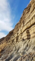 Breathtaking canyon rock formations showcasing layered sedimentary rocks and fossils in the desert