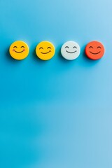 Colorful Smiley Faces on a Blue Background – Emotion Representation Through Yellow, White, and Red Smiley Icons for Joy and Happiness Themes