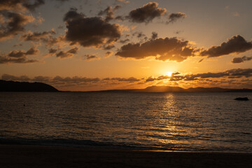 Obraz premium オクマビーチで見る夕景・沖縄県