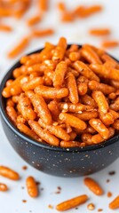 Spicy Crispy Rice Sticks in Black Bowl, Closeup Food Photography