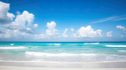 Obraz premium Stunning beach landscape with turquoise ocean waves gently washing pristine sandy shore.