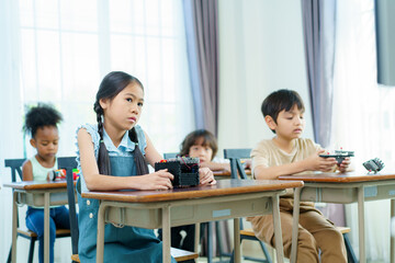 Group of diverse children enjoy learning about the STEM.