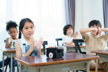 Group of diverse children enjoy learning about the STEM.
