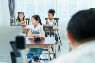 Group of diverse children enjoy learning about the STEM.