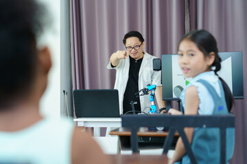 Group of diverse children enjoy learning about the STEM.