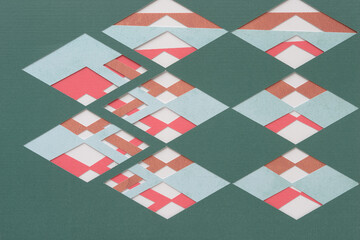 machine-cut paper with diamond or rhombus form cutouts