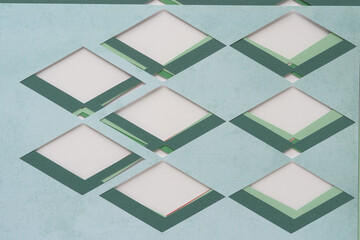 machine-cut paper with diamond or rhombus form cutouts