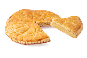 Paris, France - 01 24 2025: A homemade frangipani king cake with a slice of cake on a white background .