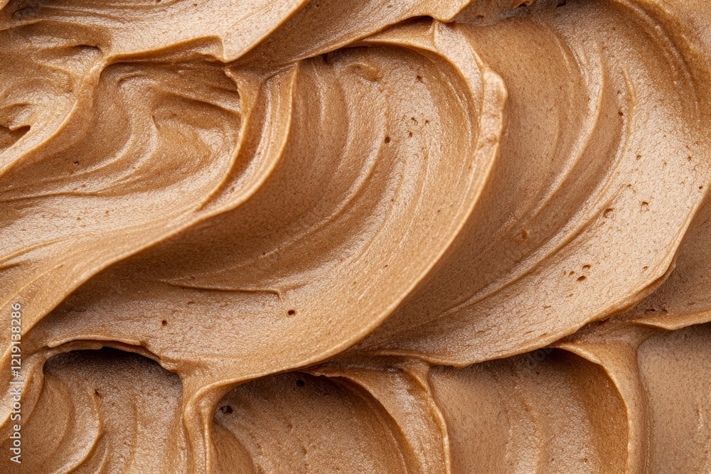 Poster top view. close-up of a smooth, glossy chocolate frosting texture with visible swirls and a sheen.