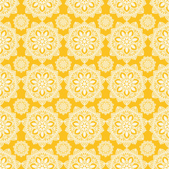 seamless pattern of yellow ethnic floral mandala motif for wallpaper and tile