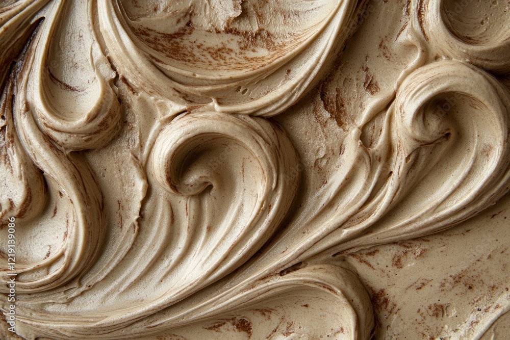 Poster top view. close-up of a smooth, glossy chocolate frosting texture with visible swirls and a sheen.