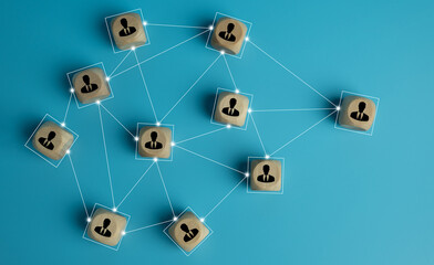 Wooden cube block with people icons and link connection network on pastel blue background,...