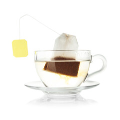 Brewing aromatic tea. Cup with teabag isolated on white