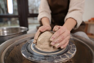Hobby and craft. Woman making pottery indoors, closeup