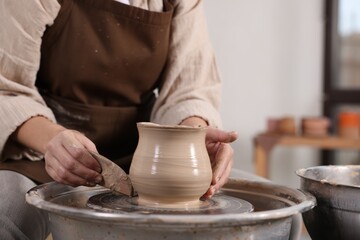Hobby and craft. Woman making pottery indoors, closeup
