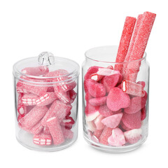 Candies in glass jars isolated on white