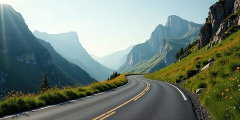 Fototapeta premium Asphalt Ribbon Winding Through a Majestic Mountain Valley, Sunlit Peaks and Verdant Slopes