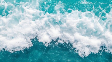 Fototapeta premium Powerful Ocean Wave Crashing on Vibrant Blue Background Representing Nature's Force