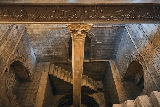 Nilometer is a structure for measuring the Nile River's clarity and water level during the annual flood season. Measuring shaft of the nilometer on Roda Island. Cairo, Egypt - September 2 2023