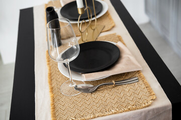 Elegant dining table setting with stylish decor and accessories for a meal