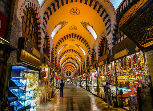 Vibrant Traditional spice Market With Decorative Arched Ceiling and Brightly Lit Colorful Stalls, Istanbul, Turkey