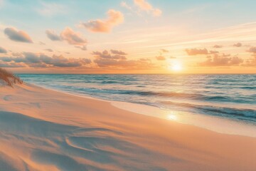 Tranquil beach scene at sunset. Calm ocean waves gently touch the shore. Golden sun illuminates the sky and sand. Peaceful tropical landscape perfect for vacations and relaxation.