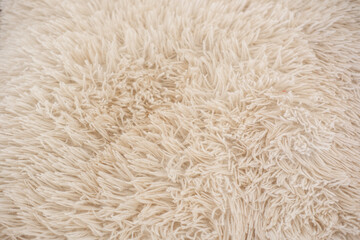Soft and fluffy carpet texture in a cozy living room setting