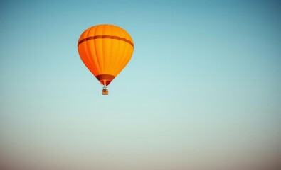 Fototapeta premium Beautiful orange air balloon on the sky balloon background balloon background party holiday celebration decoration