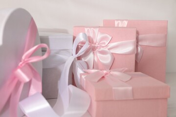 Gift boxes for wedding day on light background, closeup